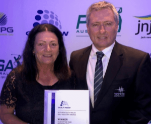 Tony-Mathew-and-Karen-Hansen-hold-the-award-e1571868545356-300x248